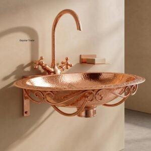 Handcrafted oval copper vessel sink with hammered texture and intricate engraved design